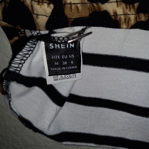 Shein size m summer top black and white stripes front dips back animal trim. - Picture 3 of 5